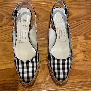 Stuart Weitzman women’s black and white checked wedges.